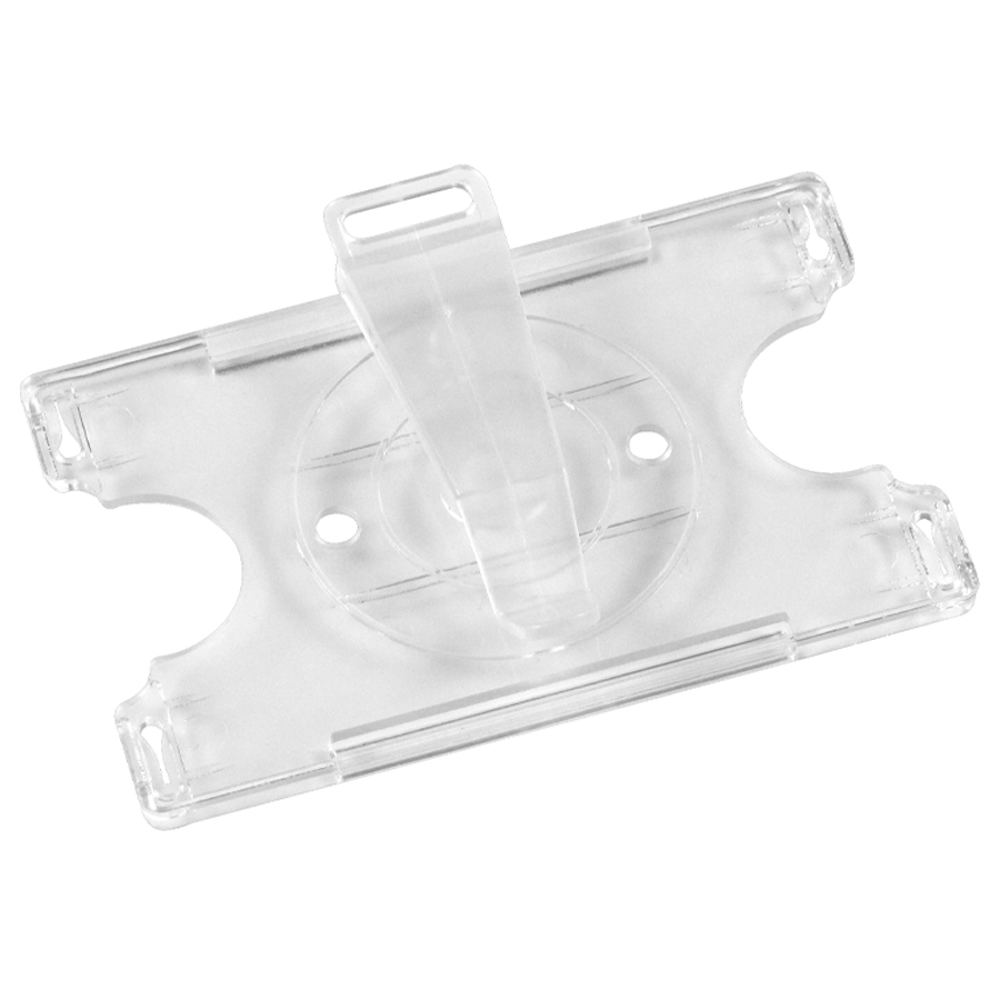 Parte posterior de un soporte transparente de plástico con clip central para sujetar tarjetas o identificaciones.