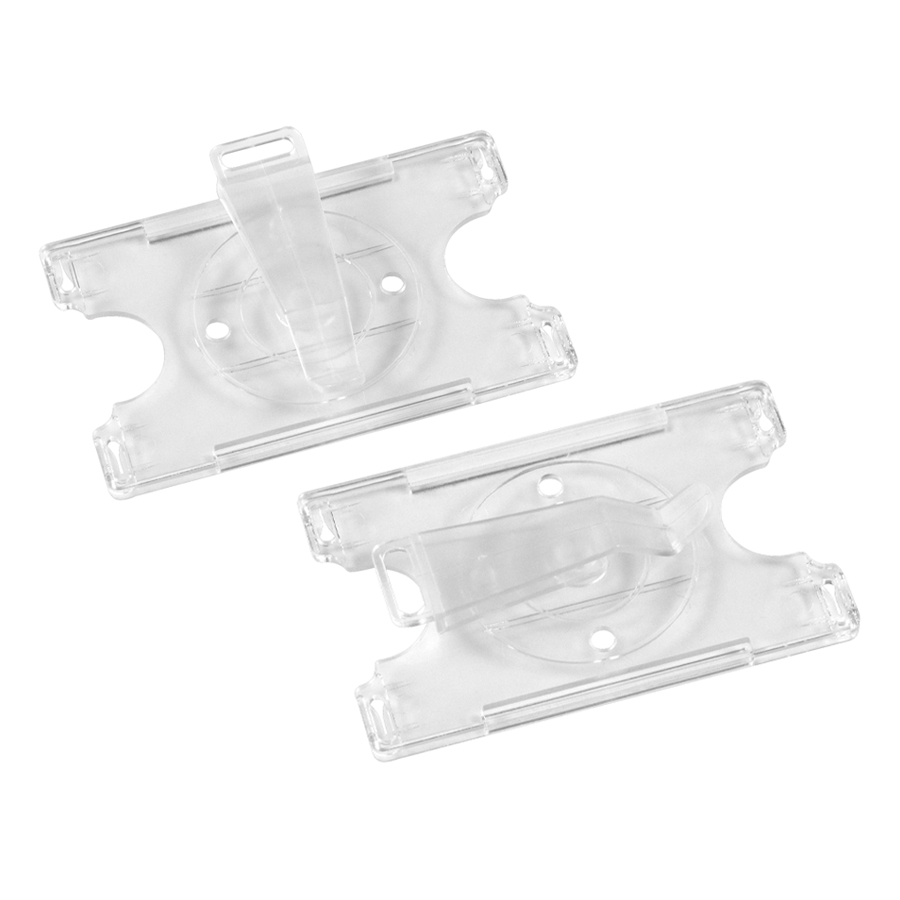 Dos soportes transparentes de plástico con clip central para sujetar tarjetas o identificaciones, vista de su parte posterior que muestra posiciones del mecanismo giratorio central.